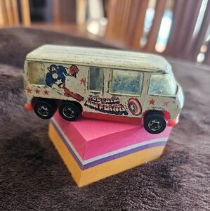 Cream and Red Vintage Toy Van with Graphic Design